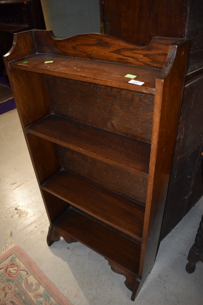 An early 20th Century oak bookshelf , dimensions approx. H107 W56 D21cm