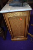 A Victorian satinwood pot cupboard having marble top, height approx. 78cm