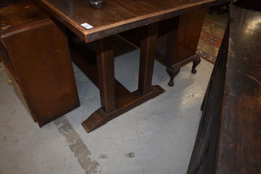 An early to mid 20th Century oak refectory style table , in the Arts and Crafts style