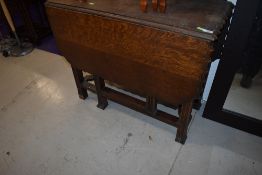 An early 20th Century gateleg table, having pie crust style top, width approx. 92cm