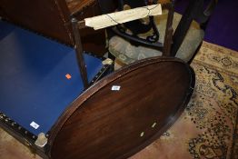 An Edwardian mahogany oval tray (some damage to gallery) and an unrelated oak frame, possibly for