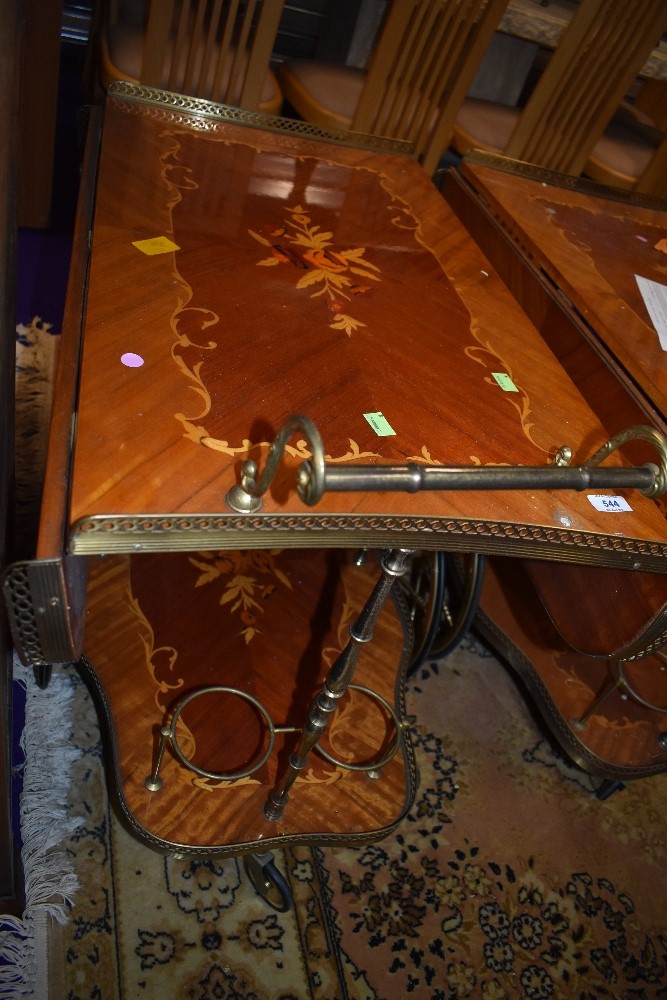 A vintage Continental style drinks trolley