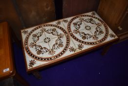 A vintage teak and tile top coffee table, approx dimensions 83 x 43cm, height approx. 33cm