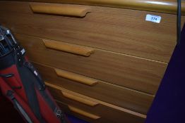 A vintage laminate (teak effect) bedroom chest of five long drawers, width approx. 77cm