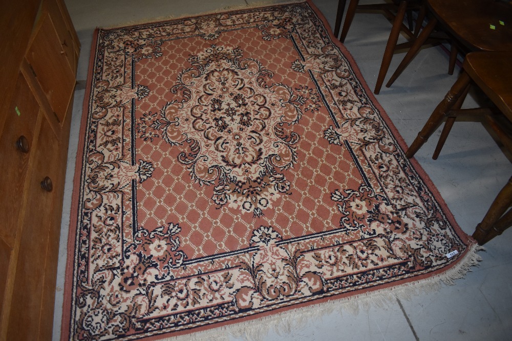 A vintage fireside rug, approx. 175 x 125cm