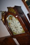 An early 19th Century mahogany cased long case clock gilt inlay and finial to top of hood , broken