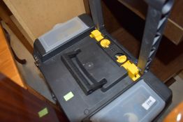 A plastic tool box/trolley