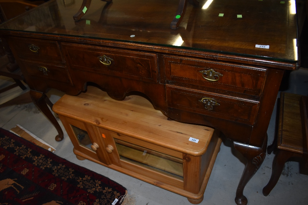 A walnut lowboy dressing table/desk , having brass escutcheons on Queen Anne style legs , width