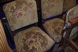 A set of six Victorian Gothic chairs having later upholstered overstuffed seats and backs