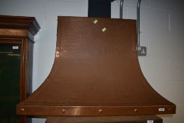 A traditional Arts and Crafts style copper fire canopy, width approx. 92cm