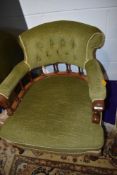 A Victorian mahogany tub chair, having bobbin back and green upholstery