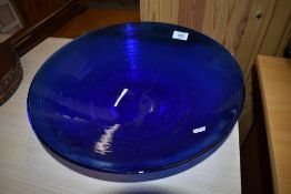 A Bristol style blue glass fruit bowl with ribbed design