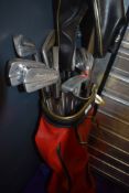 A selection of golf clubs in bag, mainly John Letters