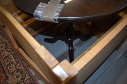 A solid wood Victorian mahogany tilt top tea or wine table
