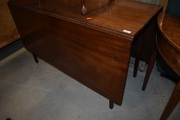 A 19th Century mahogany table having square tapered gatelegs, width approx 122cm, opens to 150cm
