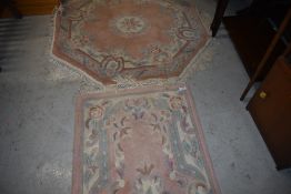 Two Chinese rugs, approx. 130 x 62cm and octagonal approx. diameter 105cm