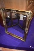 A modern gilt framed wall mirror, approx. 75 x 65cm