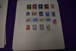 A collection of European Stamps, hinged on sheets, mint & used including Yugoslavia, Spain,