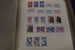 A collection of Asia Stamps, hinged on sheets, mint & used, including China, Japan, Cambodia,