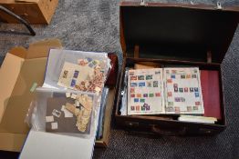 A suitcase and a box of UK and World Stamps, Covers, unused Greetings Telegrams etc