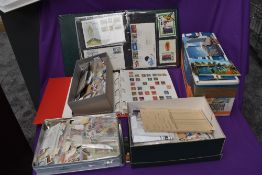 Two albums and three boxes of World Stamps and Covers, mainly used along with a box of modern