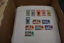 A collection of Commonwealth Stamps, on sheets, hinged, mint & used, most countries seen, sets, part