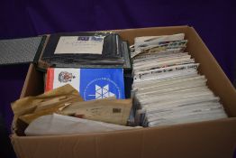 A large collection of GB First Day Covers, 1980's - 2011 along with World Stamp, loose and in