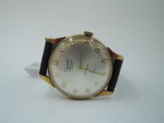 A gent's 9ct gold wrist watch by Everite having an Arabic numeral dial with subsidiary seconds in