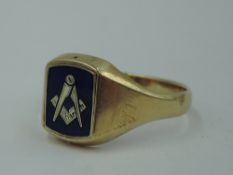 A gent's 9ct gold signet ring having a swivel panel bearing monogram to one side and enamelled