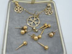 A yellow metal Maltese cross pendant on chain stamped 9ct with matching earrings and a selection