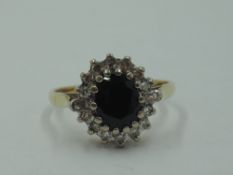 A lady's dress ring having a sapphire and diamond oval cluster having brilliant cut and baguette cut