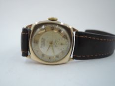 A vintage 9ct gold wrist watch by Helvetia having Arabic numeral dial with subsidiary seconds to