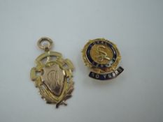 A 9ct gold long service pin and medalion, approx 10g