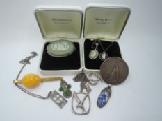 A small selection of white metal and silver jewellery including Wedgwood pendants and brooch,