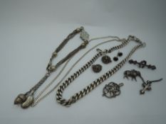 A selection of white metal and HM silver jewellery including watch chains, earrings, charms etc