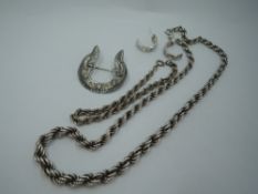 A silver graduated rope chain with matched bracelet, a pair of half hoop stud earrings having mother