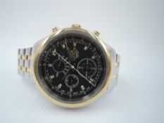 A gents wrist watch by Astron having a baton numeral dial with outer tachymeter dial and three inner