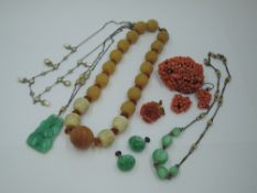 A small selection of vintage costume jewellery including coral brooch with matched earrings (AF),