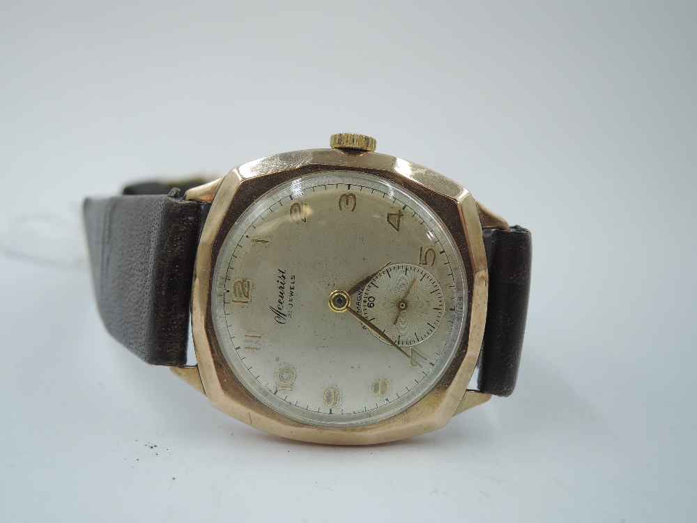A gent's 9ct gold wrist watch by Accurist having an Arabic numeral dial with subsidiary seconds in a