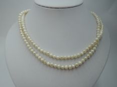 A long string of baroque pearls, approx 46'