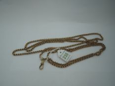 A yellow metal double link muff chain bearing a plaque stamped 15ct, approx 35g