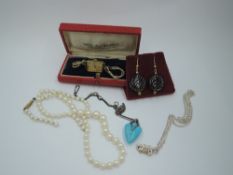 A broken string of graduated cultured pearls having 9ct gold clasp, two silver pendants and