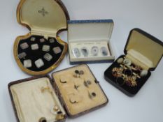 A selection of gent's cased and loose cufflinks and collar studs