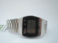 A 1970's Seiko M159-5028 Chronograph digital watch no: 740444 with steel case and Seiko steel