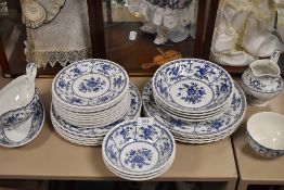Around thirty one pieces of blue and white Johnson Bros table ware including bowls and plates, jug