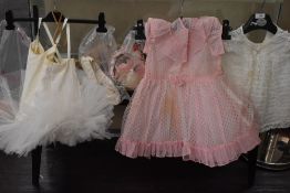 A small lot containing retro childrens clothing including a tutu and accessorises.