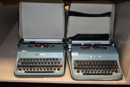 Two retro Olivetti Lettera 32 typewriters.