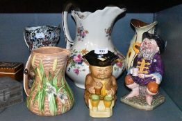 A selection of ceramic jugs including Mella ware , Woods and sons and Shorter