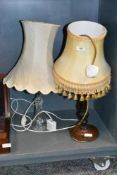 A pressed glass lamp base and similar wooden example with period shades