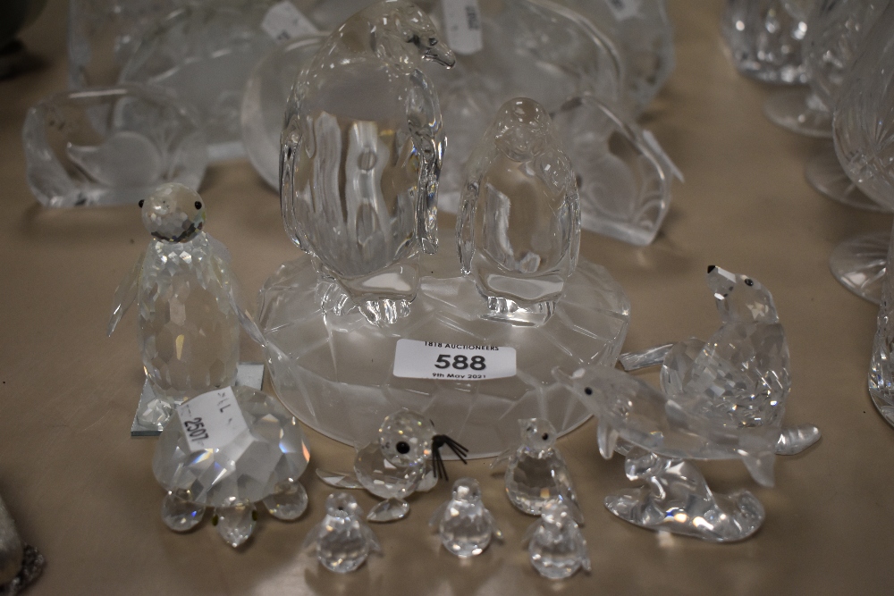 A selection of crystal animals including Swarovski penguin and more.